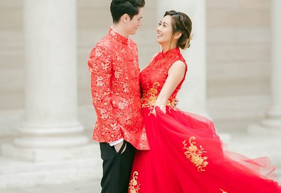 Wedding couple in red celebration attire
